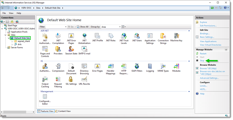 Select Default Web Site and stop it using the Stop button